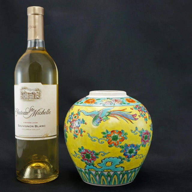 A fun and colorful Japanese porcelain jar with much hand painting that will jazz up your décor. The hand-thrown porcelain...