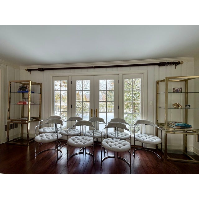 Vintage chrome barrel chair featuring a circular base and newly reupholstered in a Larsen textured weave with silver...