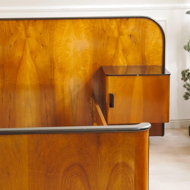 This stylish bed frame, dating from the transition between Art Deco and the Mid-Century era, captivates with its elegant...