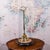 This is a tall antique display dome. An English, glass and ebonised mahogany showcase, dating to the Edwardian period,...