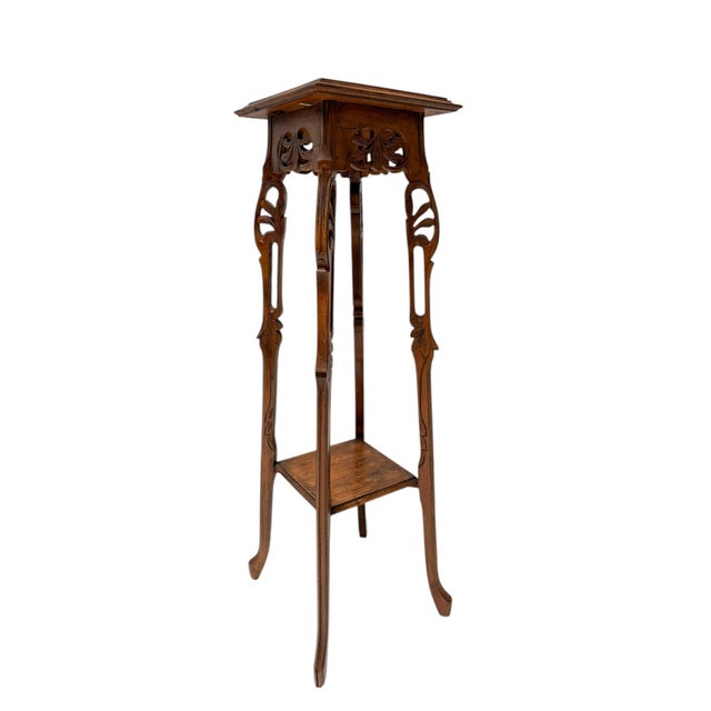 Stunning and elegant Art Nouveau pedestal or plant stand. Striking French design from the 1900s. Original hand-carved...