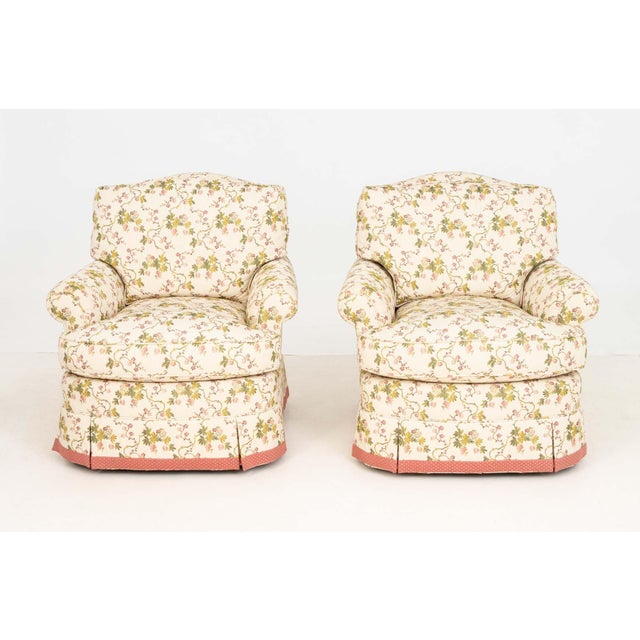 Pair of Dapha Floral Upholstered Swivel Arm Chairs, "Dapha" label to seat. 34" H x 29" W x 36" W; seat: 20" D. Provenance:...