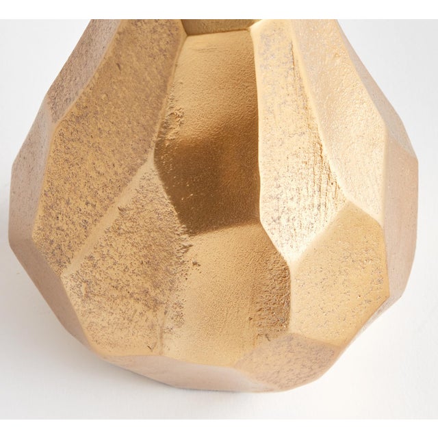 Using a traditional sand casting method, this pear sculpture is beautifully faceted, giving it a modern feel. Style within...