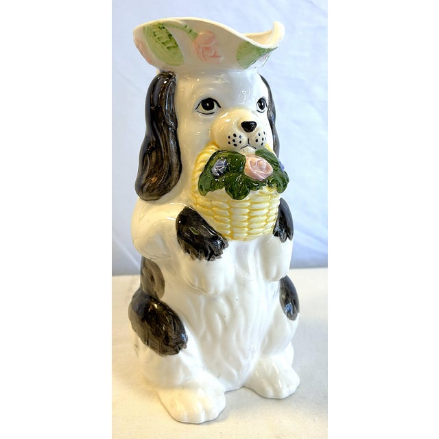 Precious vintage Staffordshire dog pitcher from 1993. The piece is made of ceramic and hand painted with wonderful details...
