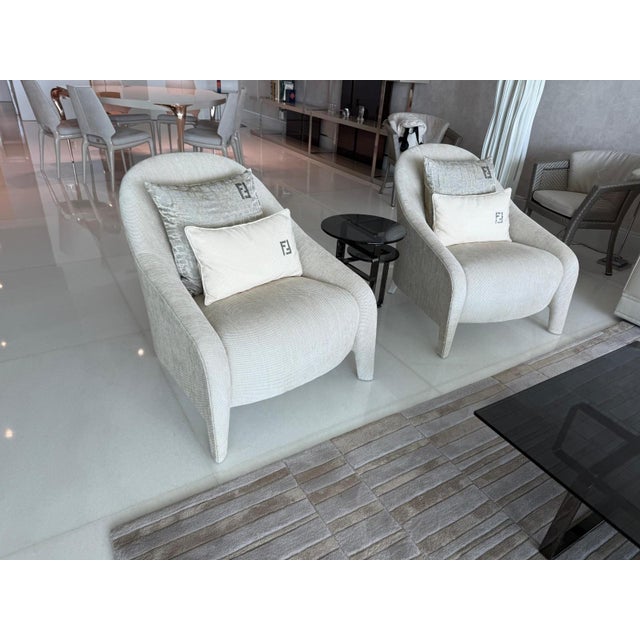 An authentic Fendi Casa Audrey armchair (Model D244), masterfully crafted in Italy. Featuring a gracefully curved...