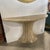 A vintage tessellated marble and brass demi lune table. The table is inlaid with brass strips and has a nice, old patina....