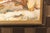 A mid-century Swedish oil painting, of a South Europe streetscape, set in a geometric motif frame. This painting from the...