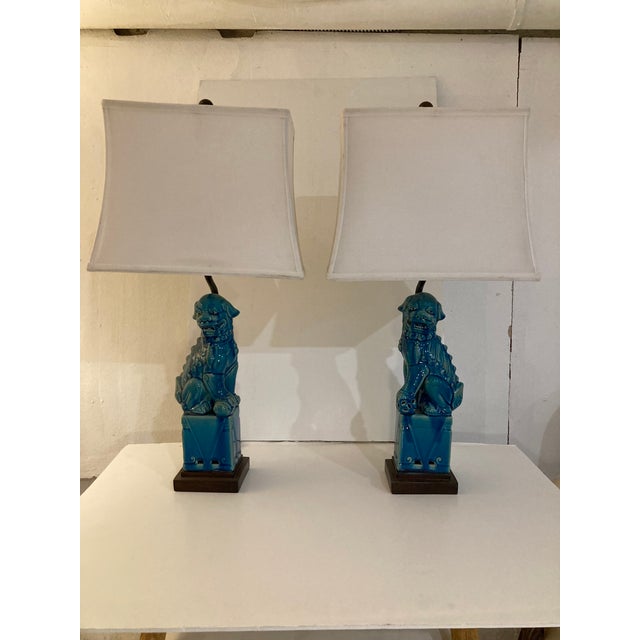 Gorgeous pair of Turquoise Glazed Porecelain Foo Dogg Table Lamps. Amazing custom wood bases and iron rear supports for...