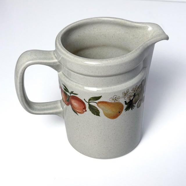 A charming pair of vintage Wedgwood creamers in the discontinued Quince pattern, made in England as part of Wedgwood’s...