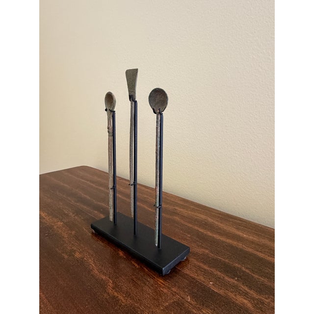 An exceptional collection of three ancient Greco-Roman bronze medical instruments dating to the Imperial Roman period,...