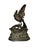 This vintage cast‑metal bird sculpture features a finely modeled bird with partially raised wings perched on a textured...