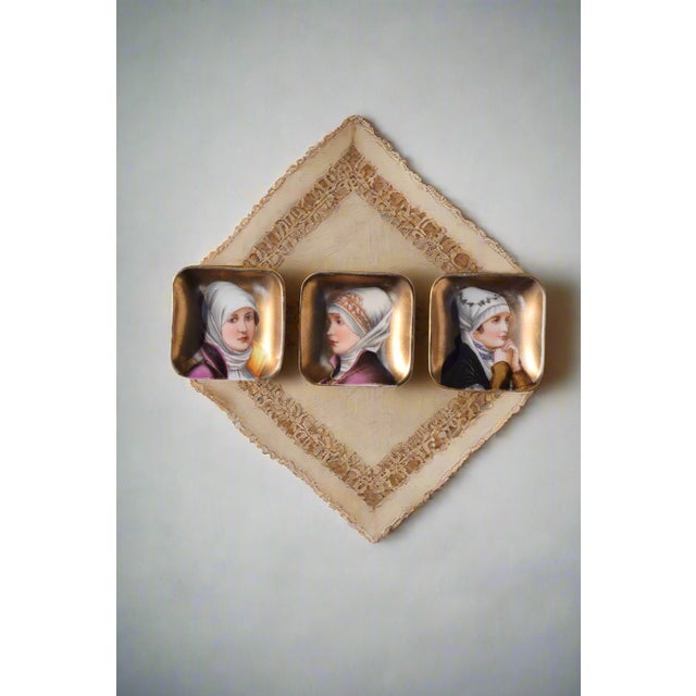 SET OF THREE PORTRAIT MINIATURE PORCELAIN DISHES Era: Late 19th/Early 20th Century Origin: Likely European (possibly...