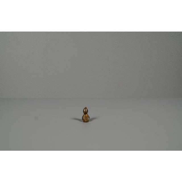 Brass duck small hand charm. Ducks from the 70s, made from brass. The duck looks in the sky and stretches its head, the...