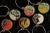 These wine glass charms are crafted from reclaimed graffiti paint. This refined street art is reminiscent of Fordite, and...