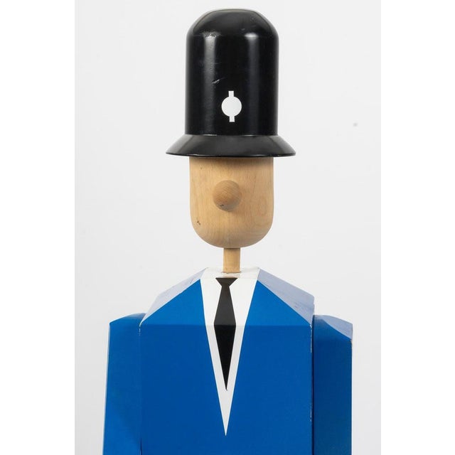 Painted wood sculpture of a Bobby with movable feet, arms and head, 20th century. 20th century painted wood sculpture of...