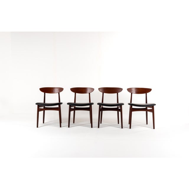 Elevate your dining space with this beautiful set of four Danish mid-century modern dining chairs. Crafted in the 1960s,...