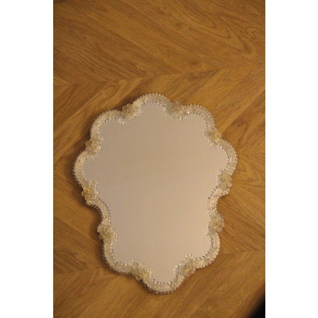 This striking and highly decorative Venetian mirror instantly elevates any interior with its luminous presence and refined...