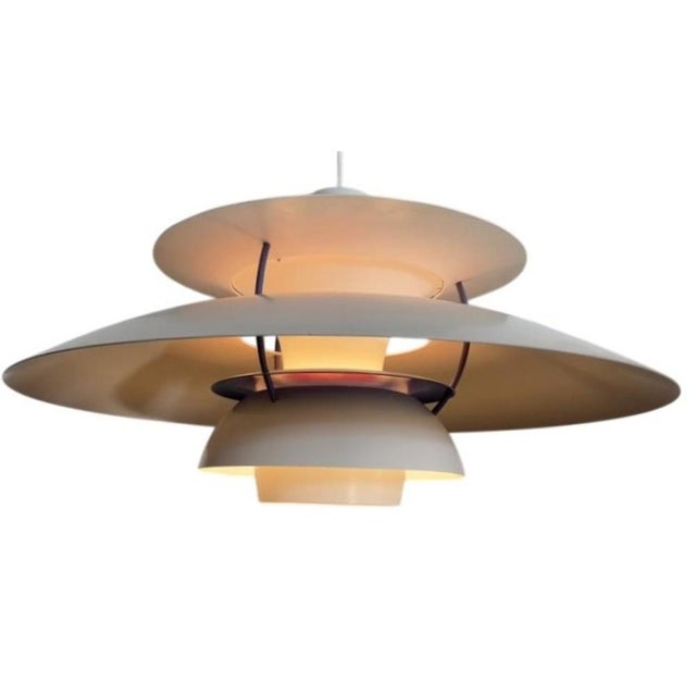 This lamp is in perfect condition. The wiring has been completely redone. The three lampshades are in excellent condition,...