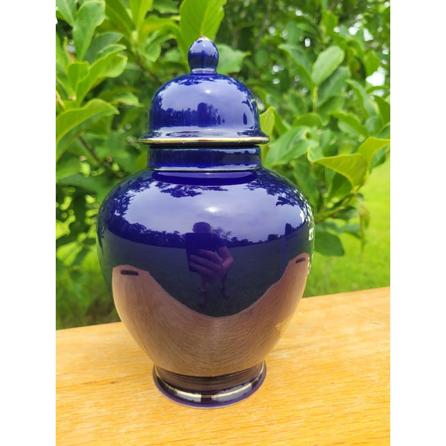 Elevate your mantel or bookshelf with this striking vintage Japanese ginger jar. Crafted in a deep lustrous, cobalt blue...