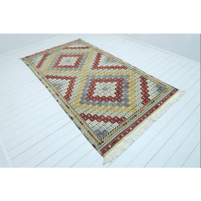 This beautiful rug from westhern of Turkey Sardes Nomads. Handspun Pure Wool on Cotton Fringes Only . The Kilim rug hosts...