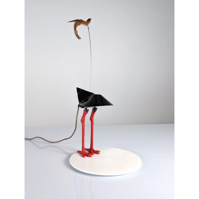 Designed in 1982 by German designer Ingo Maurer, the Bibibibi table lamp is an iconic creation of 1980s postmodern design...