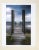 Gray sky and pier with white gate photograph. Unsigned. Unframed.