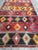 Nice vintage Caucasian Kilim with a beautiful geometrical and tribal design and nice colours with a purple and pink Blue,...