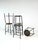 Characterful vintage bar stools from the German manufacturer SCHMITZ, featuring black lacquered tubular steel frames and...