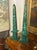 The product is a pair of French malachite obelisks, which are lovely collectibles that add a touch of elegance and...