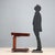 Early Victorian English side table in mahogany and mahogany veneer. The four-part top opens halfway through two doors,...