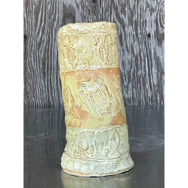 Bring authentic handcrafted beauty into your home with this original vintage studio pottery vase, a perfect embodiment of...