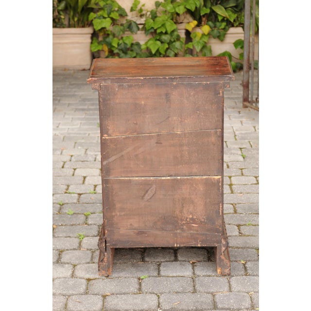 An Italian walnut petite commode from the mid-19th century, with three drawers and guilloche motifs. Born in Italy during...