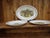 Three matching platters in different sizes and with coordinating designs. One oval platter (37 x 26 cm), one round,...