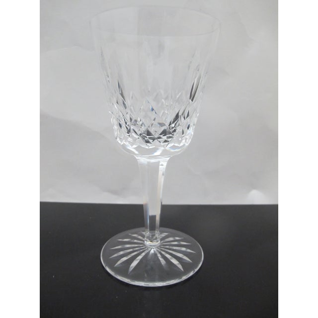Stunning Waterford crystal claret wine glass set of 4 in Lismore pattern. Each measures 5 7/8" tall x 3". Etched hallmark...