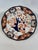 A fine English Porcelain Royal Crown Derby Plate in the style of Imari. Circa 1901. Made in England with maker's marks and...