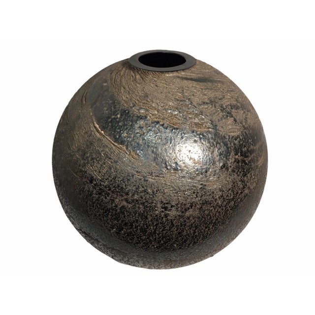 Vintage postmodern black iridescent Itlian glass vase. This large statement piece features a sphere shaped body with a...