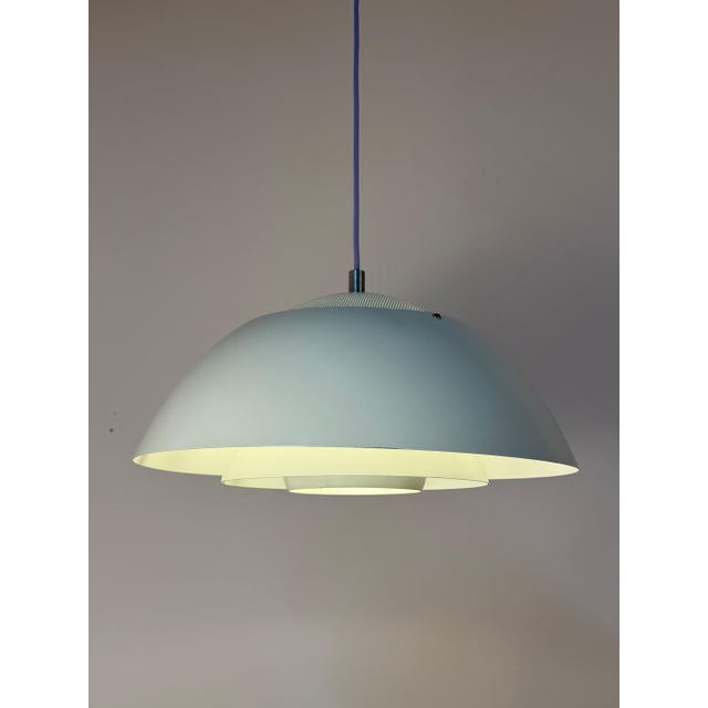 An award-winning milestone of Danish lighting design: The white Safari pendant lamp was designed by the renowned design...