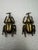 The vintage pair of solid brass knobs are crafted in the form of stylized rhinoceros beetles, featuring detailed legs,...