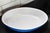 A stunning vintage French oval ceramic baking dish in rich cobalt blue with a white glazed interior. The exterior is...