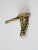 This is an antique brass door knocker with a distinctive scalloped crest and sconce-like silhouette. The decorative...