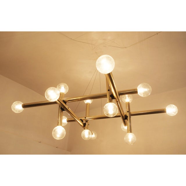 This rs 16 hl system lamp was designed by j.t. Kalmar and manufactured by kalmar in the 1970s. The construction is made of...