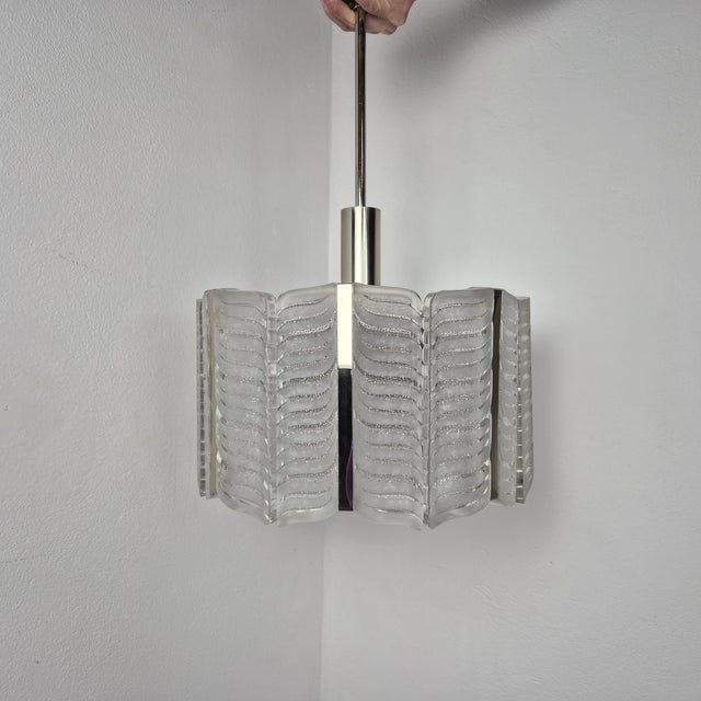 An impressive vintage chandelier by Kalmar, showcasing elegant Central European modernism with a subtle sense of luxury....