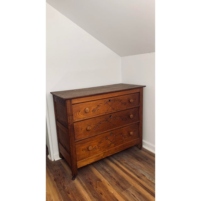 So charming yet unfussy! Hand carved (spoon carved floral motifs! ), solid oak with exceptional tiger striations. Sturdy...