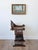 A striking late 19th-century Italian Renaissance Revival Savonarola chair, circa 1870–1900, crafted in richly patinated...