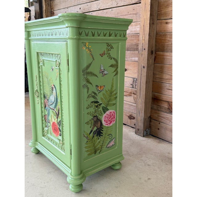 A wonderfully whimsical Habersham wood cabinet transformed with custom decorative artwork by artist Tammy Ristau. Finished...