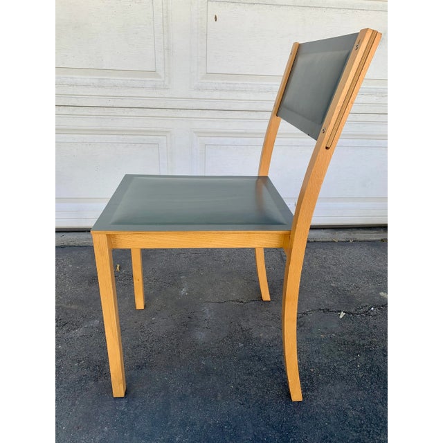 This is a great Italian chair with wood base and padded leather seats and back. Perfect for that mid century, modern, or...