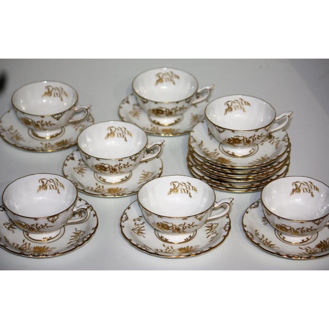 This dinner service for twelve is the beautiful "Marquis" pattern # A1222. All pieces are white with lovely gold...