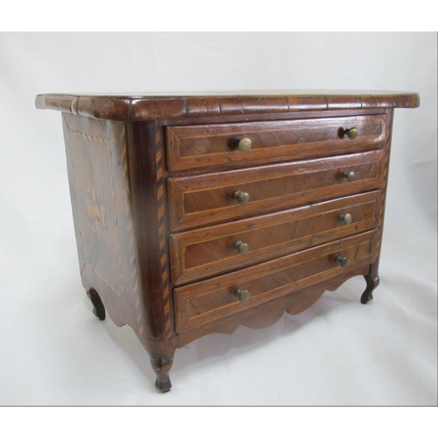 Stunning antique miniature wood dresser box with gorgeous wood inlay patterns. Neoclassical or Louis XIV style footed...