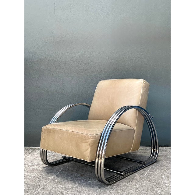The Ralph Lauren Hudson Street Lounge Chair is a definitive icon of urban luxury, masterfully blending the geometric rigor...