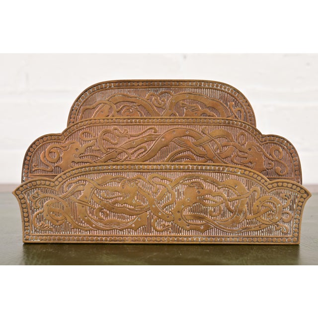 A gorgeous Art Deco or Arts & Crafts period "Viking" collection bronze letter rack In the manner of Tiffany Studios By...